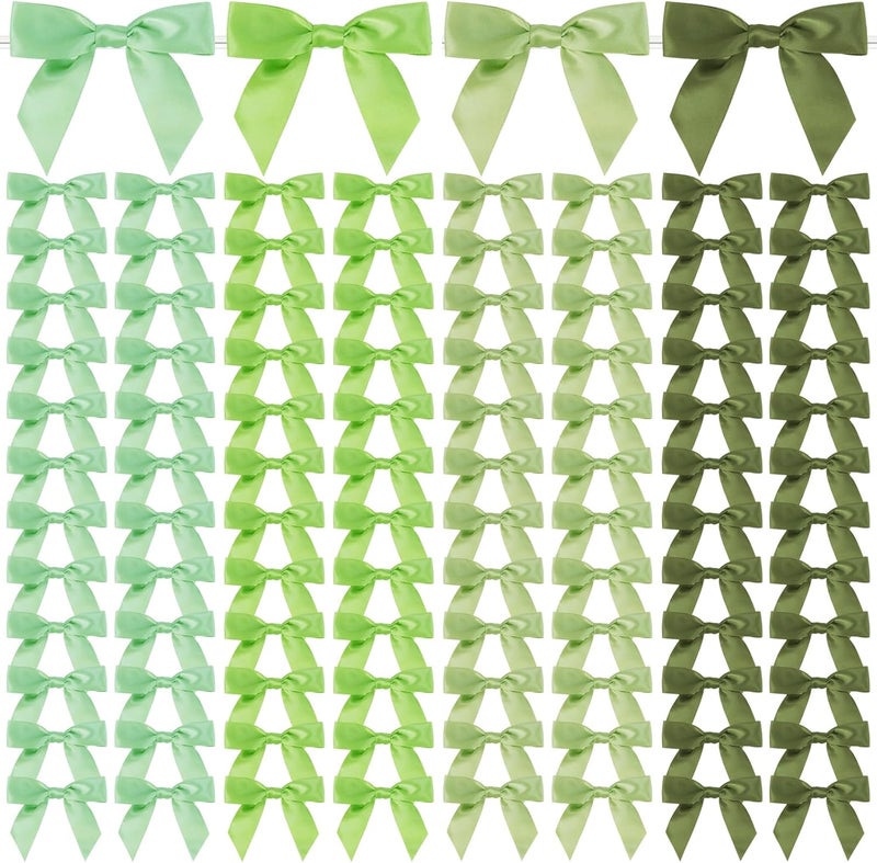 Adodotoe Christmas Twist Tie Bows, 100 Pcs Satin Twist Tie Bows for Treat Bag Satin Ribbon Tie Bows for Tying Up Packages Present Bags Bakery Candy Bags Decorating Ribbon Bow Gift Wrap Bows (Mix Green) - Image 1